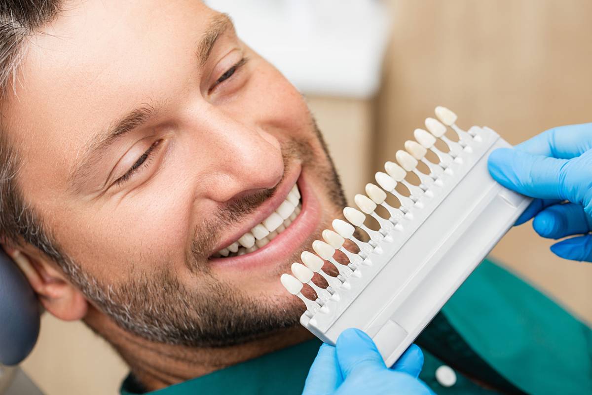 Man wondering if he can repair a chipped tooth while at the dentist's office.