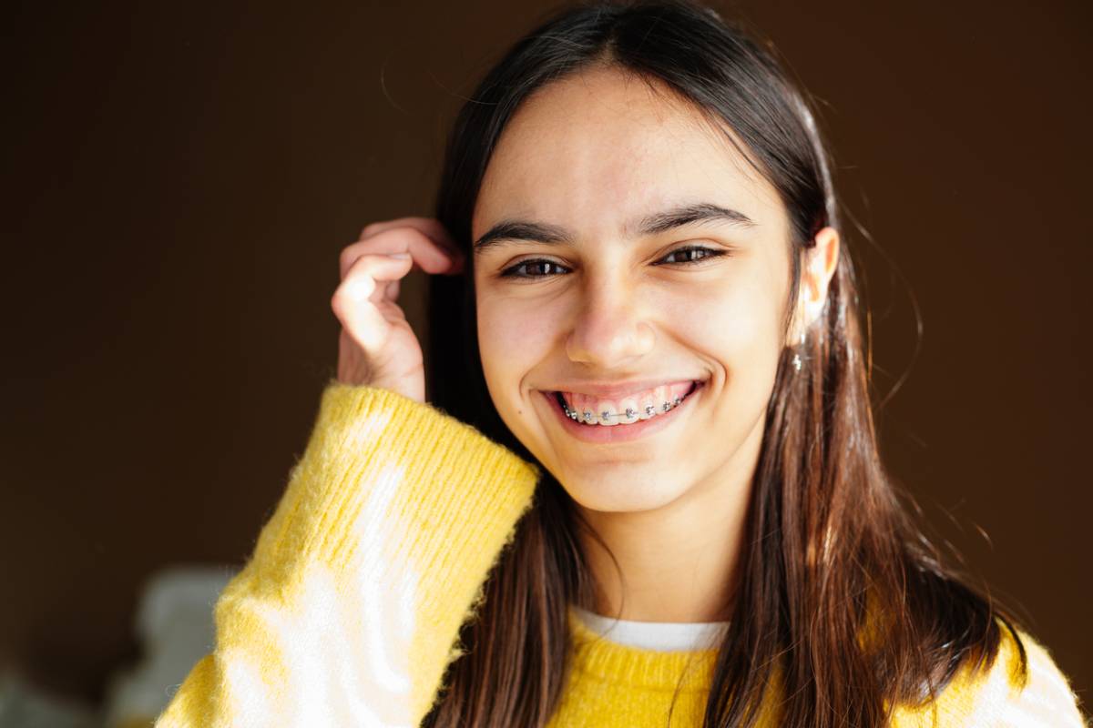 Teen smiling with braces